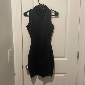 SKIMS black onsie. Worn one time, dry cleaned. Mock neck, no sleeves.